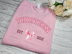 Personalised Kids / adults unisex BABY PINK welsh bow BIRTHDAY AGE year jumper