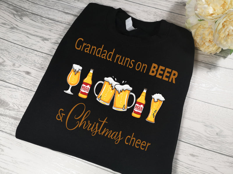 Personalised Unisex BLACK NAME runs on BEER & christmas cheer Christmas jumper