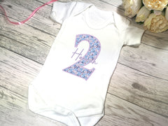 Personalised White Baby vest suit with floral number birthday name